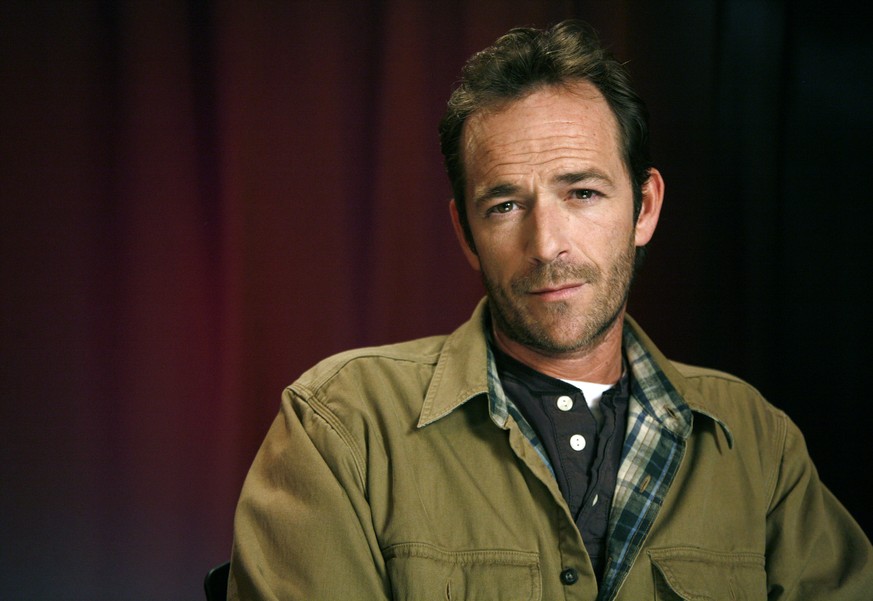 FILE - In this Jan. 26, 2011 file photo, actor Luke Perry poses for a portrait in New York. Perry, who gained instant heartthrob status as wealthy rebel Dylan McKay on &quot;Beverly Hills, 90210,&quot ...