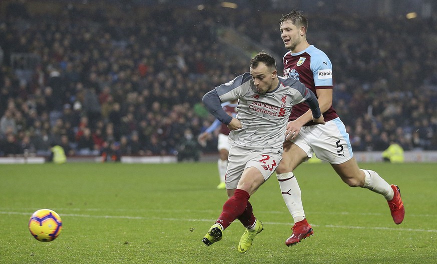 Liverpool&#039;s Xherdan Shaqiri scores his side&#039;s third goal of the game against Burnley, during their English Premier League soccer match at Turf Moor in Burnley, England, Wednesday Dec. 5, 201 ...
