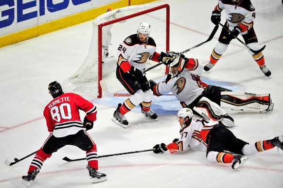 May 23, 2015; Chicago, IL, USA; Chicago Blackhawks center Antoine Vermette (80) scores the game winning goal against the Anaheim Ducks during the second overtime period in game four of the Western Con ...