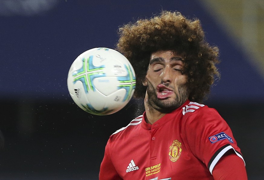 2017 AP YEAR END PHOTOS - Manchester United&#039;s Marouane Fellaini heads the ball during the UEFA Super Cup final soccer match between Real Madrid and Manchester United at Philip II Arena in Skopje, ...