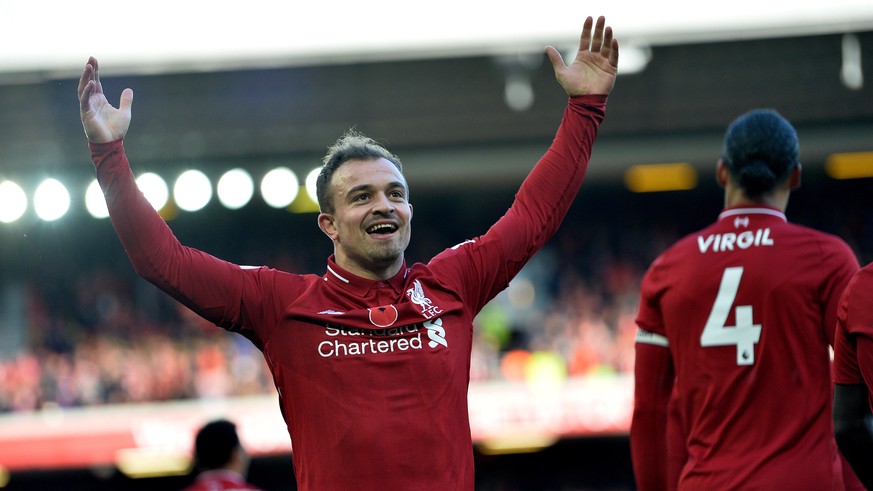 epa07158236 Liverpool&#039;s Xherdan Shaqiri celebrates scoring the second goal making the score 2-0 during the English Premier League soccer match between Liverpool and Fulham at the Anfield in Liver ...