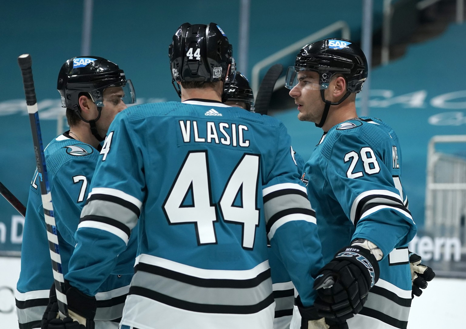 San Jose Sharks right wing Timo Meier (28) is congratulated by Marc-Edouard Vlasic (44) after scoring a goal against the St. Louis Blues during the first period of an NHL hockey game in San Jose, Cali ...