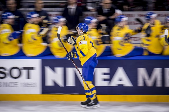 epa06740203 Mattias Janmark of Sweden celebrates after a scoring during the IIHF World Championship group A ice hockey match between Russia and Sweden in Royal Arena in Copenhagen, Denmark, 15 May 201 ...