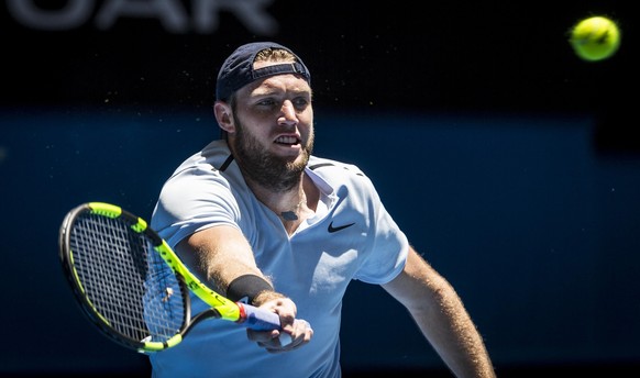 epa06409955 Jack Sock of the USA in action against Karen Khachanov of Russia during their match of the men&#039;s singles on day one of the Hopman Cup tennis tournament at Perth Arena in Perth, Wester ...