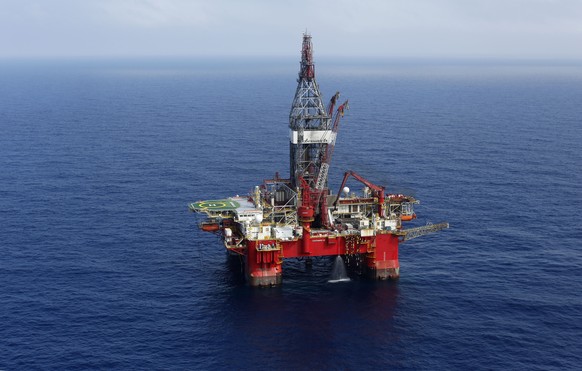 FILE - This Friday, Nov. 22, 2013, file photo shows the Centenario deep-water drilling platform off the coast of Veracruz, Mexico in the Gulf of Mexico. Bidding on federal oil and gas leases in the Gu ...