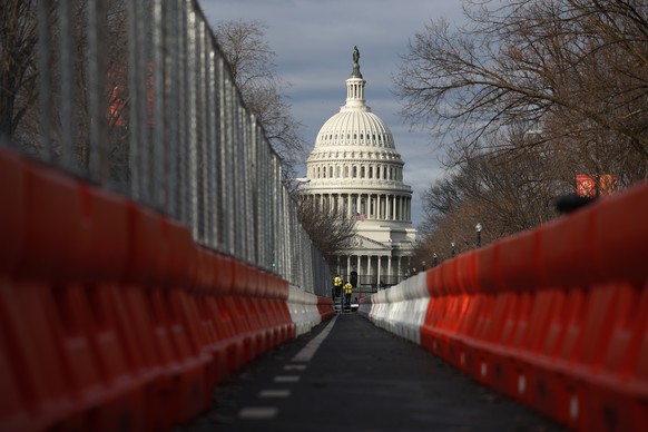 Steel fencing and barb wire surround the Capitol building as security is heightened ahead of President-elect Joe Biden&#039;s inauguration ceremony, Tuesday, Jan.19, 2021, in Washington. (AP Photo/Reb ...