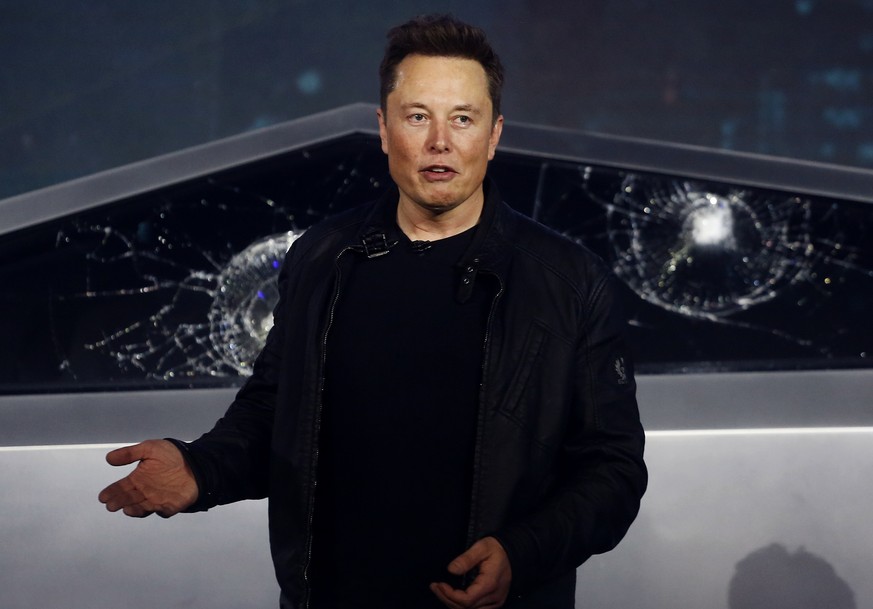 FILE - In this Nov. 21, 2019, file photo, Tesla CEO Elon Musk introduces the Cybertruck at Tesla&#039;s design studio in Hawthorne, Calif. Tesla CEO Elon Musk appears to have hit all the milestones ne ...