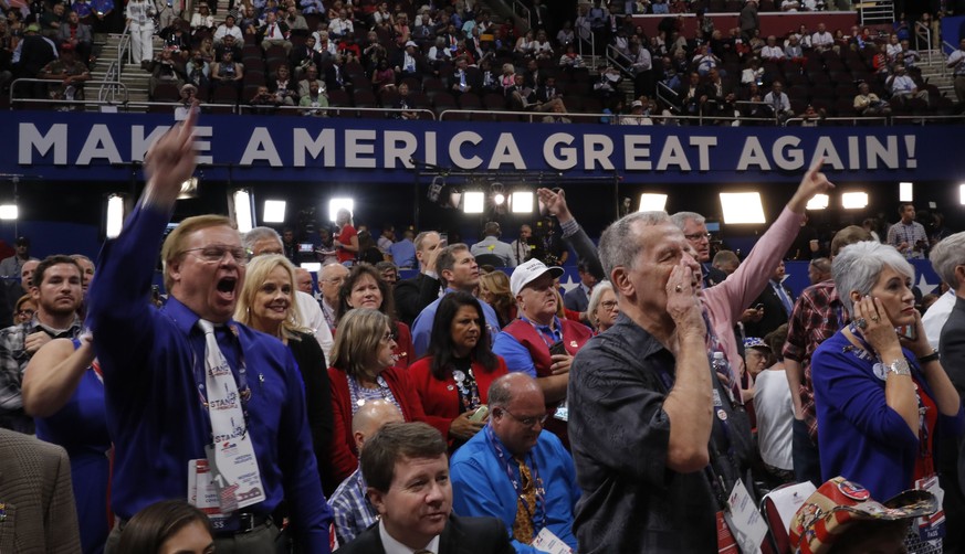 Republican National Convention delegates yell and scream as the Republican National Committee Rules Committee announces that it will not hold a recorded vote on the Rules Committee&#039;s Report and r ...