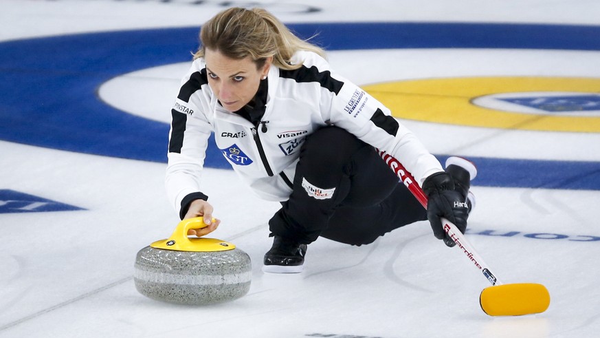 Switzerland skip Silvana Tirinzoni makes a shot against Russia in the final at the women&#039;s world curling championship in Calgary, Alberta, Sunday, May 9, 2021. (Jeff McIntosh/The Canadian Press v ...