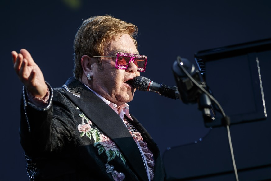 FILE - British singer Elton John performs during his &quot;Farewell Yellow Brick Road&quot; tour at the 53rd Montreux Jazz Festival (MJF), in Montreux, Switzerland on, June 29, 2019. Due to the global ...