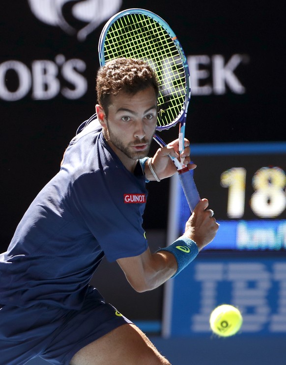 United States&#039; Noah Rubin plays a return to Switzerland&#039;s Roger Federer during their second round match at the Australian Open tennis championships in Melbourne, Australia, Wednesday, Jan. 1 ...