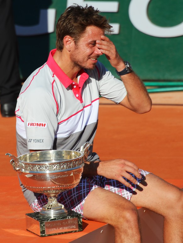 Roland Garros French Open Tennis Paris 07/06/2015 Day 15. 
Stanislas Wawrinka (SUI) celebrates with the winners trophy after he wins Mens singles final in four sets - Photo: Roger Parker International ...