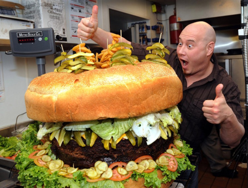 The Absolutely Ridiculous Burger – $2,000
When everyone else on this list was getting fancy, Mallie’s Sports Bar and Grill just went big. It’s the Guiness world record holder for the largest burger, a ...