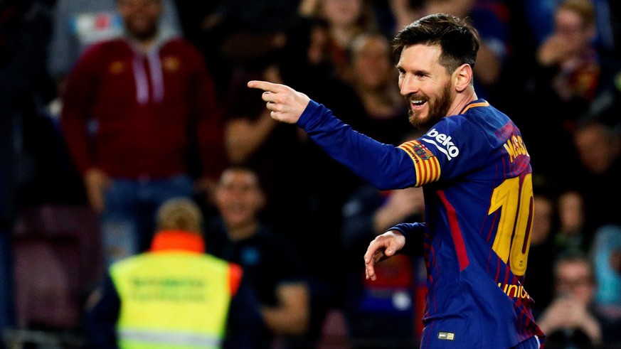 epa06653280 FC Barcelona&#039;s forward Leo Messi celebrates after scoring his second goal during the Spanish Primera Division soccer match between Barcelona and Leganes at Camp Nou stadium in Barcelo ...