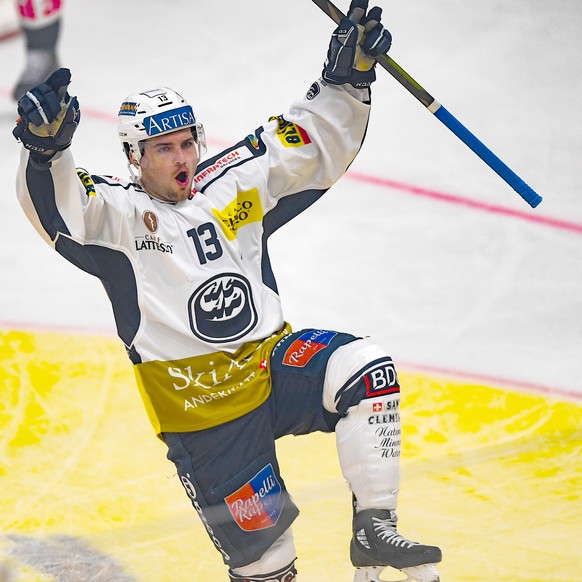Ambri&#039;s player Marco Mueller celebrates the 0-3 goal, during the preliminary round game of National League A (NLA) Swiss Championship 2019/20 between HC Lugano and HC Ambri Piotta at the ice stad ...