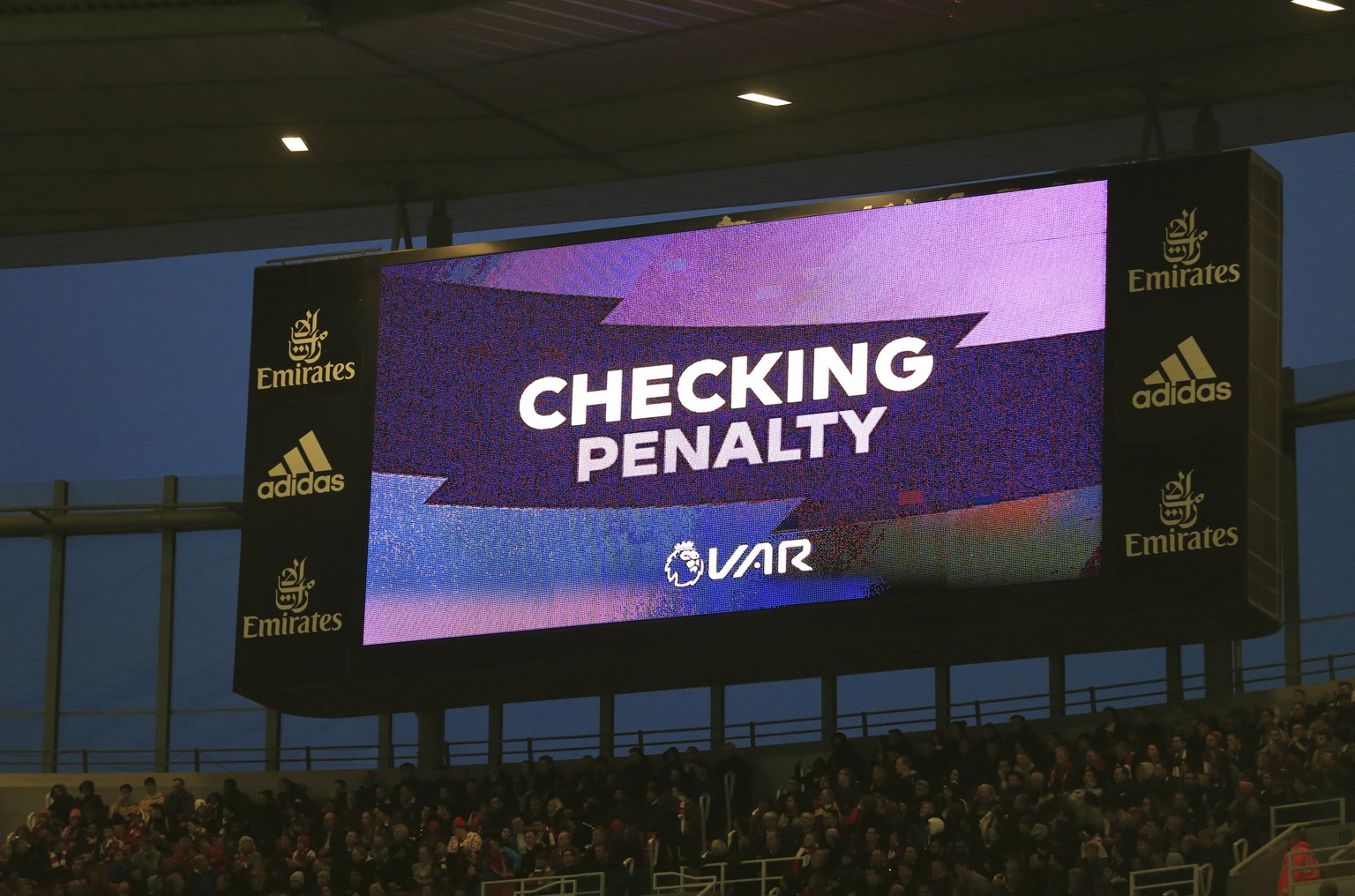 A scoreboard displays the VAR during the English Premier League soccer match between Arsenal and Crystal Palace at the Emirates stadium in London, Sunday, Oct. 27, 2019. (AP Photo/Leila Coker)
