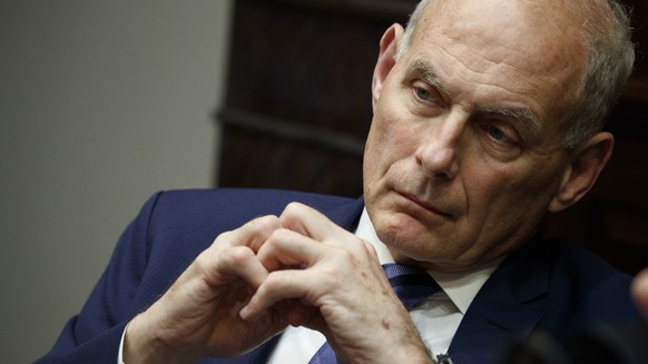FILE - In this June 21, 2018 file photo, White House chief of staff John Kelly listens as President Donald Trump speaks during a lunch with governors in the Roosevelt Room of the White House in Washin ...