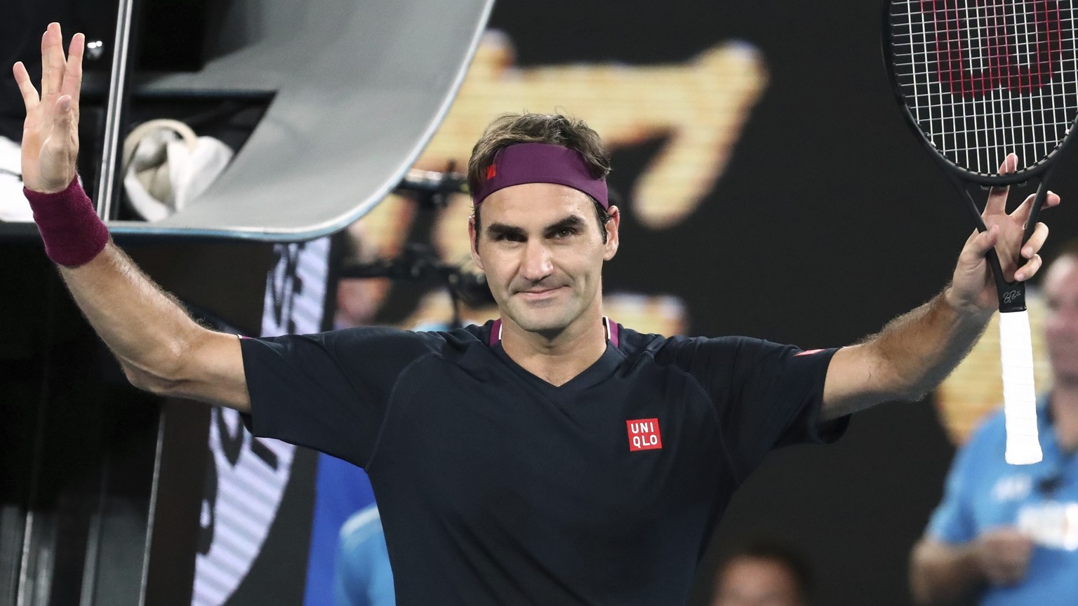 Switzerland&#039;s Roger Federer celebrates after defeating Serbia&#039;s Filip Krajinovic in their second round singles match at the Australian Open tennis championship in Melbourne, Australia, Wedne ...