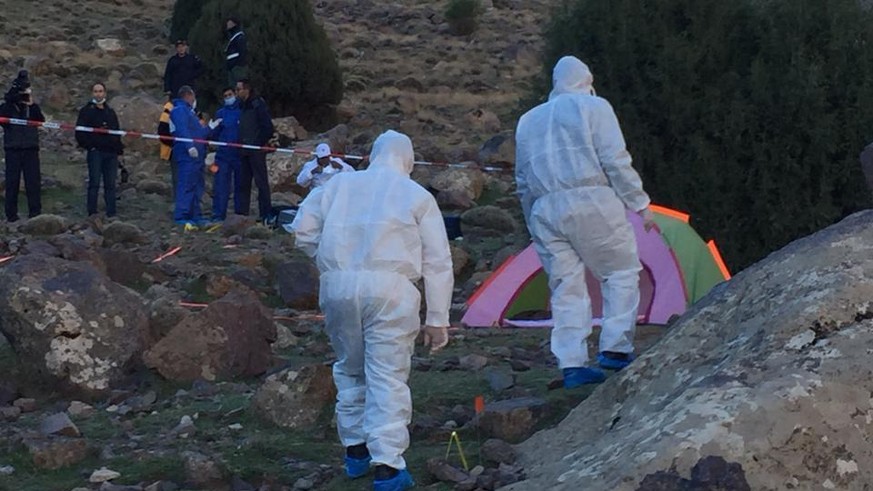 In this photo provided by Moroccan news channel 2M and taken on Tuesday, Dec. 18, 2018, a forensic team is seen at the area where the bodies of two Scandinavian women tourists were found dead, near Im ...