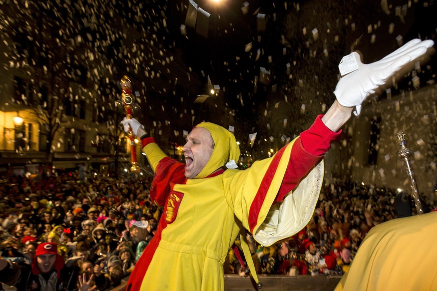 Revellers attend the &quot;Urknall&quot; (Big Bang), which initiates at 5 o&#039;clock in the morning the carnival (Fasnacht) of Lucerne, Switzerland, Thursday, February 4, 2016. (KEYSTONE/Alexandra W ...