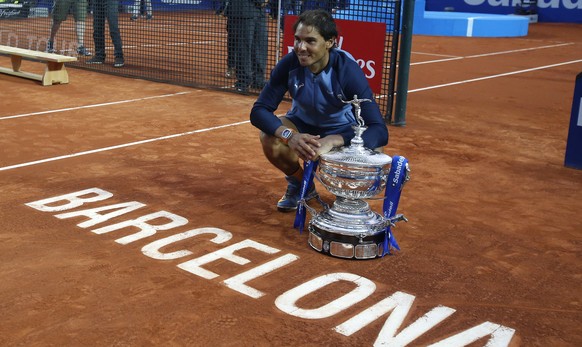 Spain&#039;s Rafael Nadal poses for a photo with the trophy after winning the Barcelona Open tennis tournament in Barcelona, Spain, Sunday, April 24, 2016. Spain&#039;s Rafael Nadal defeated Japans K ...