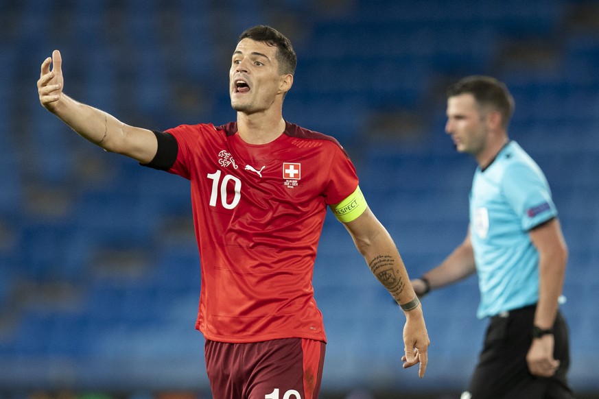 Switzerland&#039;s Granit Xhaka gestures during the UEFA Nations League group 4 soccer match between Switzerland and Germany at the St. Jakob-Park stadium in Basel, Switzerland, on Sunday, September 6 ...