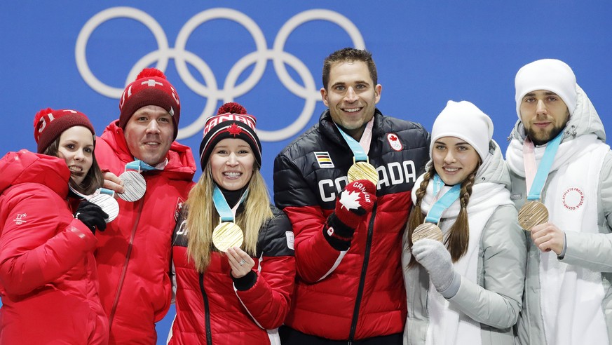 epa06524260 Gold medal winners John Morris (center R) and Kaitlyn Lawes of Canada, silver medalists Roman Rios (2L) and Jenny Perret (L) of Switzerland and bronze medalists, Olympic Athletes from Russ ...