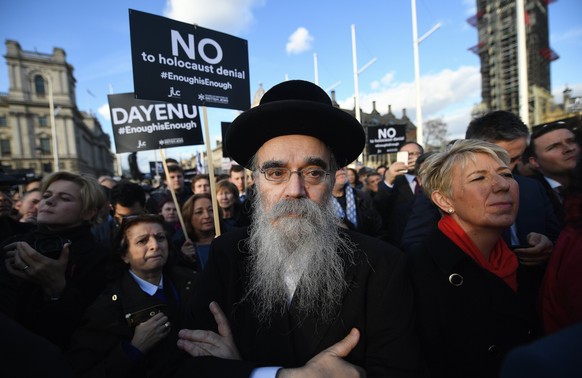 epa06630857 Members of London&#039;s Jewish community protest outside The British Houses of Parliament in London, Britain, 26 March 2018. The Jewish community have called on Labour leader Jeremy Corby ...