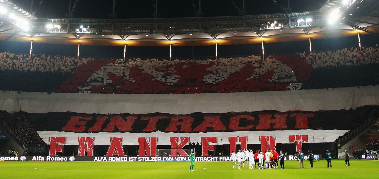 FRANKFURT AM MAIN, GERMANY - FEBRUARY 14: Fans of Frankfurt welcome the teams with a choreography for the Bundesliga match between Eintracht Frankfurt and FC Schalke 04 at Commerzbank-Arena on Februar ...