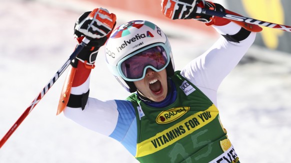 Switzerland&#039;s Michelle Gisin reacts at finish area after completing an alpine ski women&#039;s World Cup giant slalom in Courchevel, France, Monday, Dec. 14, 2020. (AP Photo/Marco Trovati)