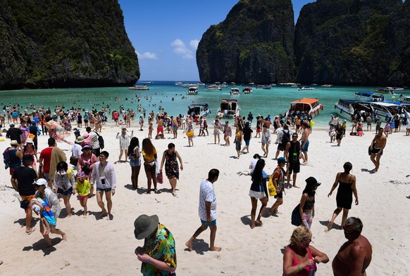 This photo taken on April 9, 2018 shows a crowd of tourists on the Maya Bay beach, on the southern Thai island of Koh Phi Phi. 
Across the region, Southeast Asia&#039;s once-pristine beaches are reeli ...