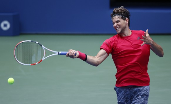 epa08653259 Dominic Thiem of Austria in action against Felix Auger-Aliassime of Canada during their match on the eighth day of the US Open Tennis Championships at the USTA National Tennis Center in Fl ...