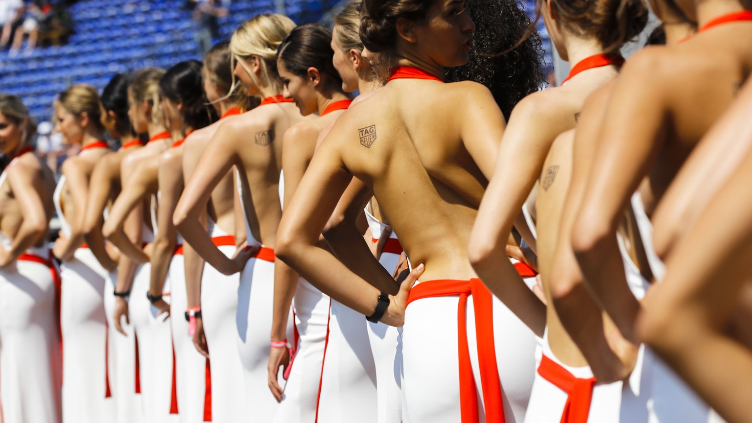 FILE - In this file photo dated Saturday, May 27, 2017, so called &quot;grid girls&quot; line up after the qualifying session for the Formula One Grand Prix at the Monaco racetrack in Monaco. Formula  ...