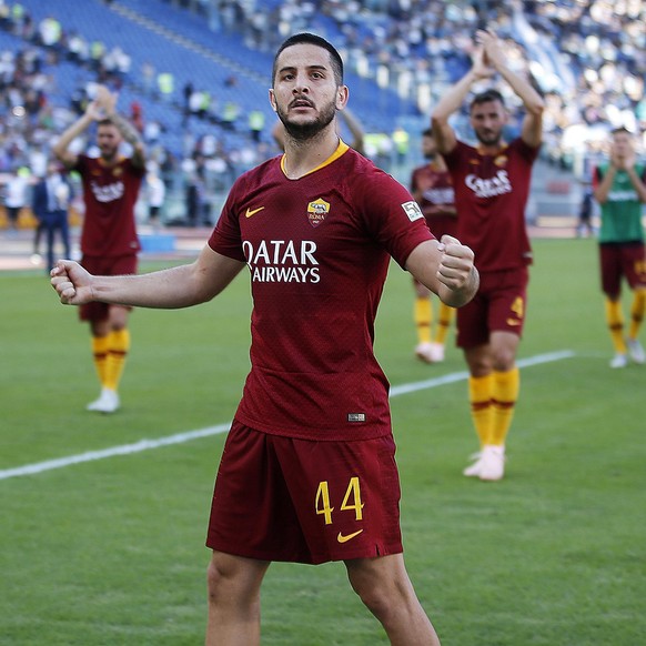 epa07056813 Roma&#039;s Kostas Manolas (L) and Lorenzo Pellegrini (R) celebrate after the Italian Serie A soccer match between AS Roma and SS Lazio at Olimpico stadium in Rome, Italy, 29 September 201 ...