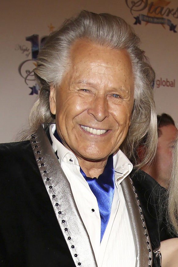 FILE - In this March 2, 2014, file photo, Peter Nygard attends the 24th Night of 100 Stars Oscars Viewing Gala at The Beverly Hills Hotel in Beverly Hills, Calif. Nygard faces criminal charges in New  ...