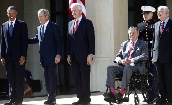 President Barack Obama stands with, from second from left, former Presidents George W. Bush, Bill Clinton, George H.W. Bush, and Jimmy Carter at the dedication of the George W. Bush presidential libra ...