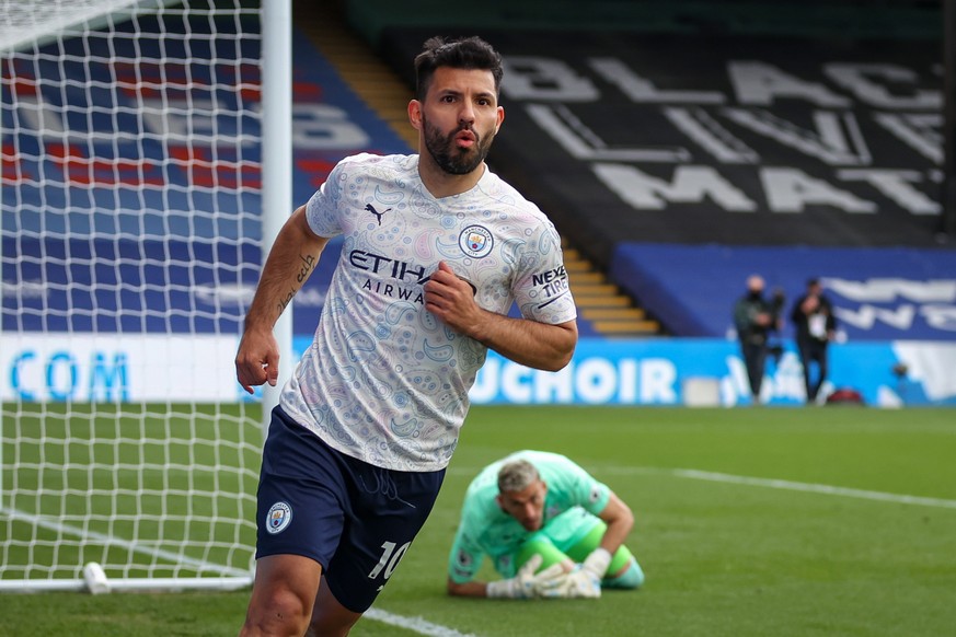 epa09171437 Sergio Aguero of Manchester City reacts after scoring a goal during the English Premier League soccer match between Crystal Palace and Manchester City in London, Britain, 01 May 2021. EPA/ ...