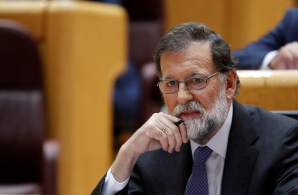epa06292172 Spanish Prime Minister, Mariano Rajoy, looks on during the Senate&#039;s extraordinary plenary session on the application of Article 155 of the Spanish Constitution, in Madrid, Spain, 27 O ...