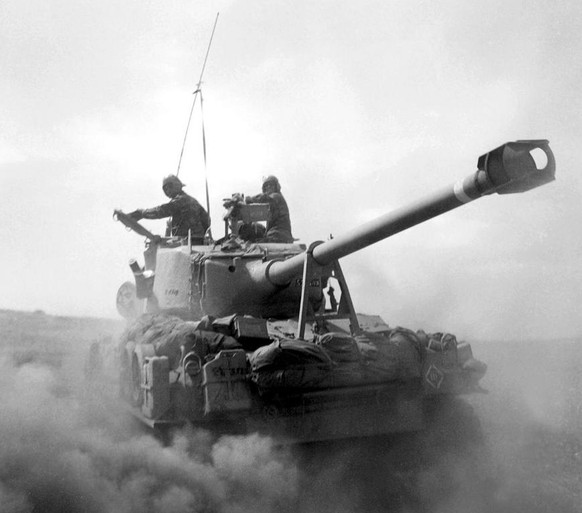 A US-built Israeli tank churns dust in the desert in this file photo taken in June 1967 on the Golan Heights. Thirty years after the six-day war, new revelations show that Israeli generals exerted con ...