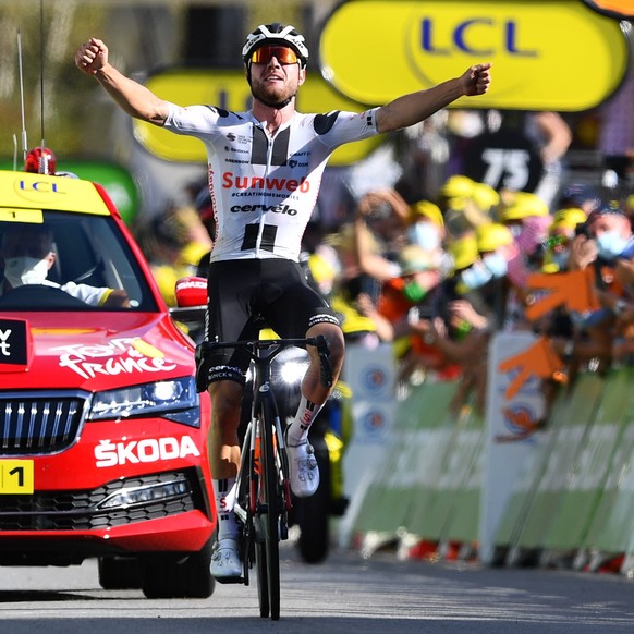epa08659254 Swiss rider Marc Hirschi of Team Sunweb wins the 12th stage of the Tour de France cycling race over 218km from Chauvigny to Sarran, France, 10 September 2020. EPA/Stuart Franklin / Pool