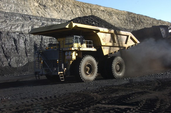 FILE - In this Nov. 15, 2016 file photo, a haul truck with a 250-ton capacity carries coal from the Spring Creek strip mine near Decker, Mont. President Trump&#039;s latest move to support coal mining ...
