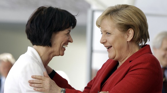 German Chancellor Angela Merkel, right, welcomes the President of Switzerland, Doris Leuthard, left, in front of the chancellery in Berlin, Germany, Wednesday, April 28, 2010. (AP Photo/Michael Sohn)  ...