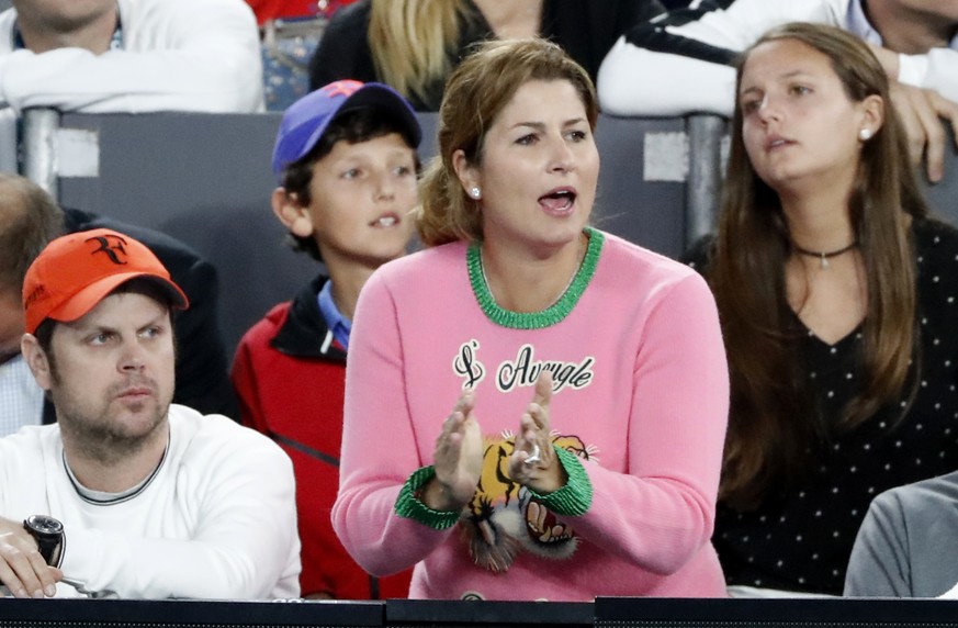 Mirka Federer cheers on husband Roger of Switzerland during his semifinal against compatriot Stan Wawrinka at the Australian Open tennis championships in Melbourne, Australia, Thursday, Jan. 26, 2017. ...