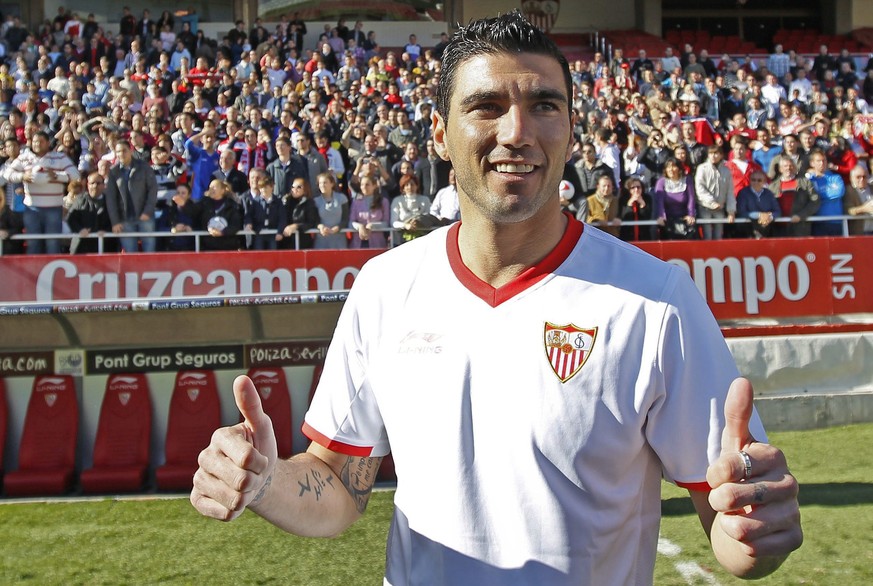 epa07617384 Jose Antonio Reyes posing for photographers during his presentation at Sanchez Pizjuan stadium in Seville, southern Spain, 06 January 2012. (Issued 01 June) Sevilla FC announced 01 June 20 ...
