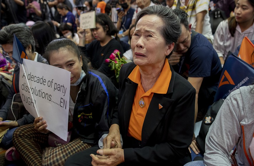 A supporter of Thailand&#039;s Future Forward Party cries as they watch a live television broadcast of a court verdict at their party&#039;s headquarters in Bangkok, Thailand, Friday, Feb. 21, 2020. T ...