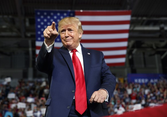 FILE - In this Wednesday, July 17, 2019 file photo, President Donald Trump gestures to the crowd as he arrives to speak at a campaign rally at Williams Arena in Greenville, N.C. Donald Trump