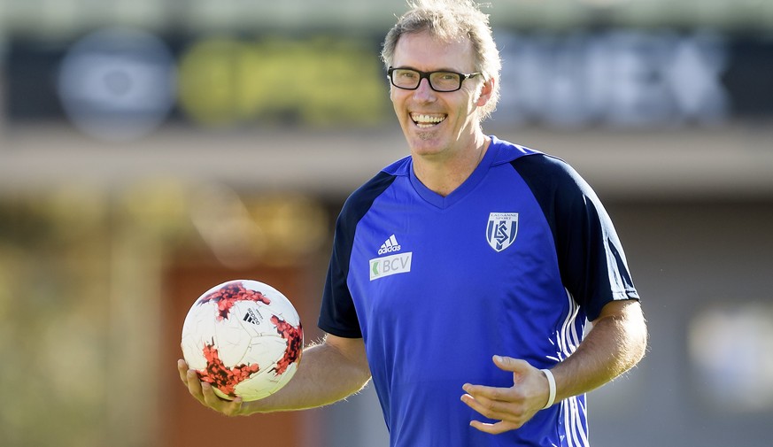 epa06273631 Former soccer player Laurent Blanc from France reacts during a training session with young soccer players in Lausanne, Switzerland, 18 October 2017. Laurent Blanc is in Lausanne for the so ...