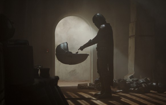 This image released by Disney Plus shows a scene from &quot;The Mandalorian.&quot; An announcement on the Star Wars Twitter account Wednesday said new episodes would be available on Disney+ starting o ...