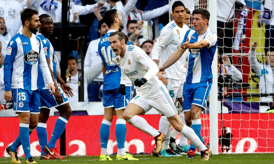 epa06461529 Real Madrid&#039;s Welsh winger Gareth Bale (C) celebrates after scoring his second goal during a Spanish league La Liga soccer match between Real Madrid and Deportivo at Santiago Bernabeu ...