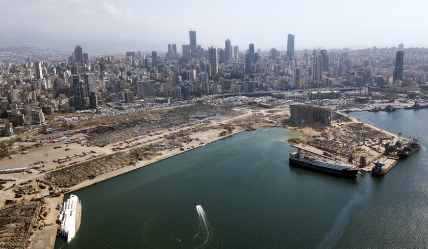 epa08598944 A picture taken with a drone shows a general view of destroyed port area four days after explosions that hit Beirut port, in Beirut, Lebanon, 08 August 2020 (issued 12 August 2020). Lebane ...